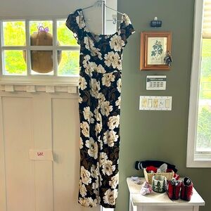 Old navy long pants romper, never worn.  Flower pattern